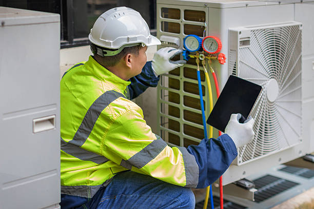 Professional Heat Pump Repair technician working in Arrington, TN